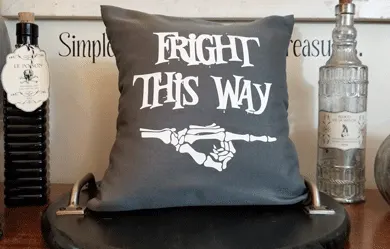 Fright This Way Throw Pillow cover using a gray pillowcase from the dollar store.
