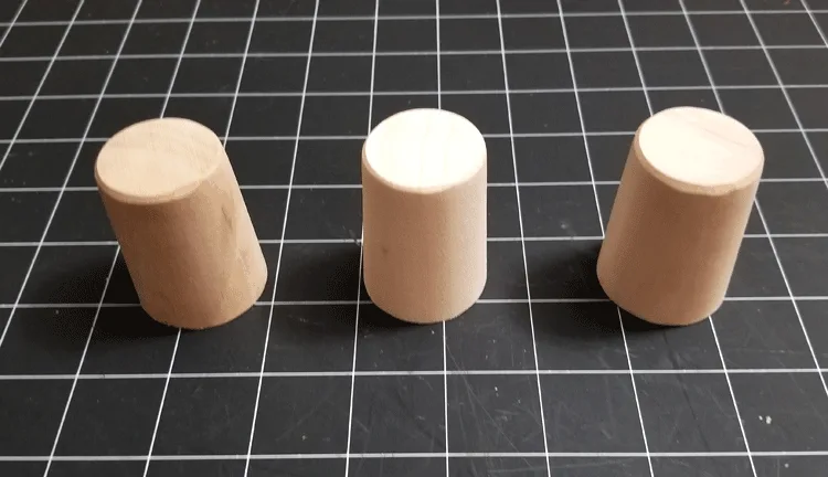 Ends of the rolling pins cut into 3 legs/feet