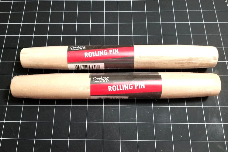 Dollar Store rolling pins to cut and use as legs/feet for my buffet tray.