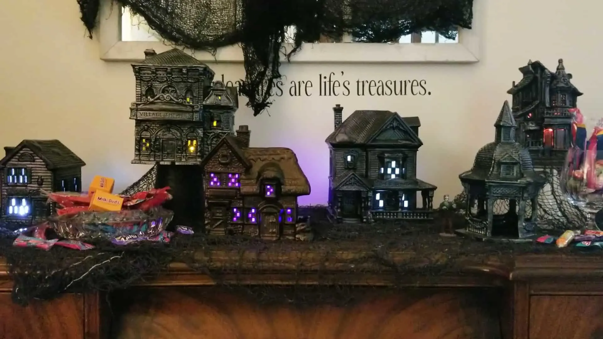 Final spooky Halloween village with lights.