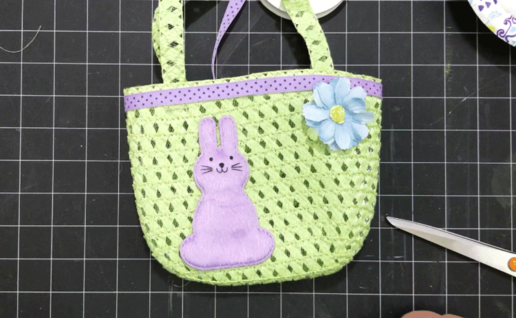The little purse all done with bunnies and ribbon.