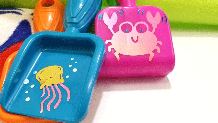 Finished sea creatures of multiple colors of vinyl on fun little sand and garden toys.