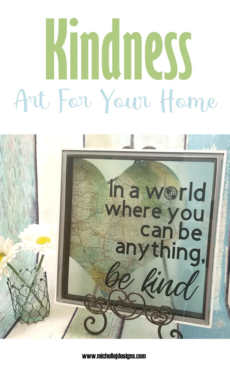 Finished piece of diy kindness art displayed on an easel.