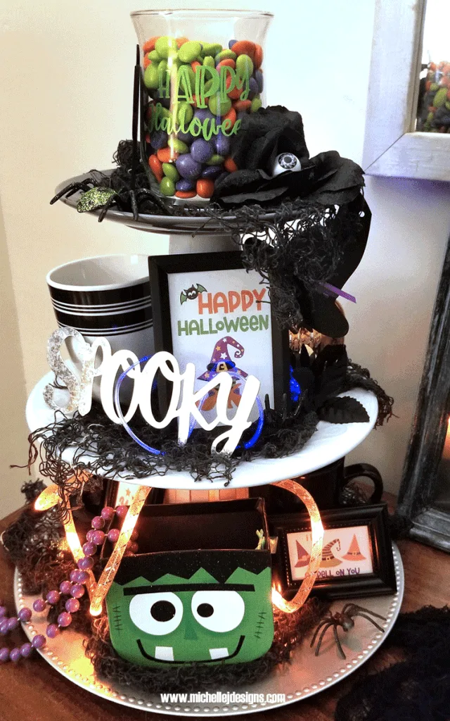 I created this DIY tiered tray and added some fun whimsical Halloween Decor.