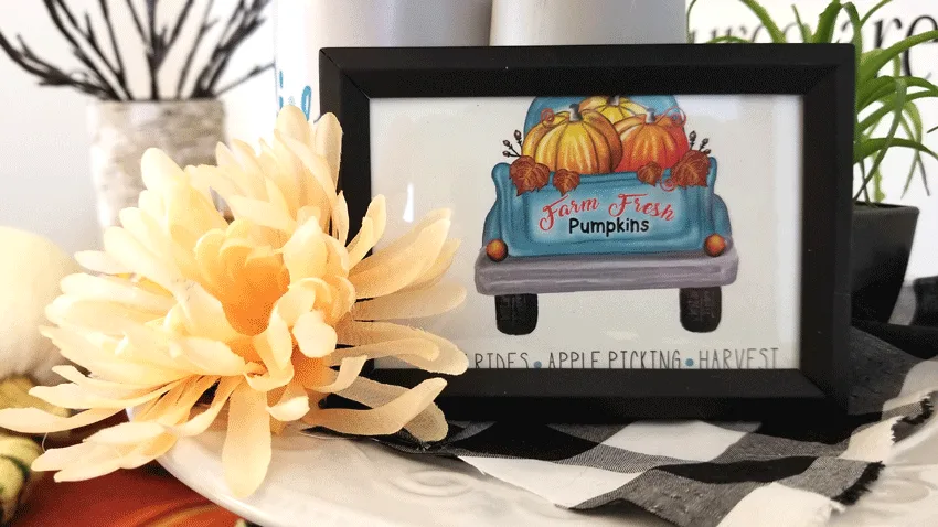 A close up view of the vintage truck farmhouse printable on the tray