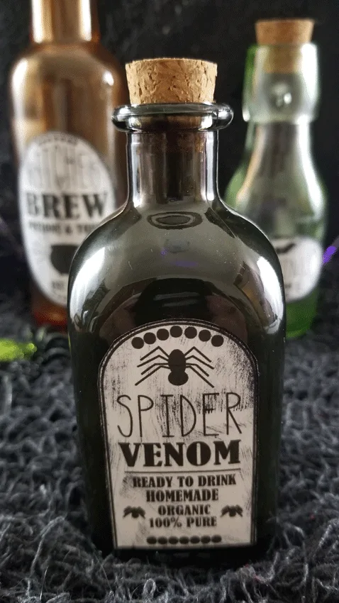 Finished purple bottle with the spider venom label.