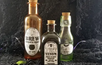 Tinted glass bottles with potion labels
