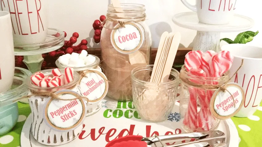 Finished glass jars with peppermint sticks and mini marshmallows