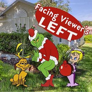 Yard art with the Grinch stealing Christmas, Max and Cindy Lou Who