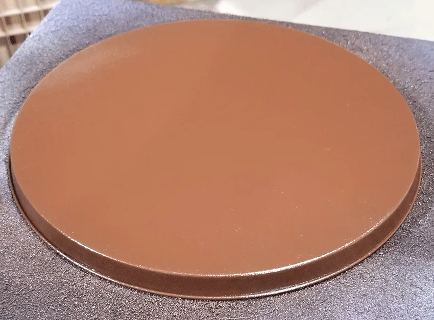 The bottom of the burner covers spray painted brown