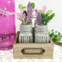 Cute mini vases made from glass salt and pepper shakers and chalky paint.