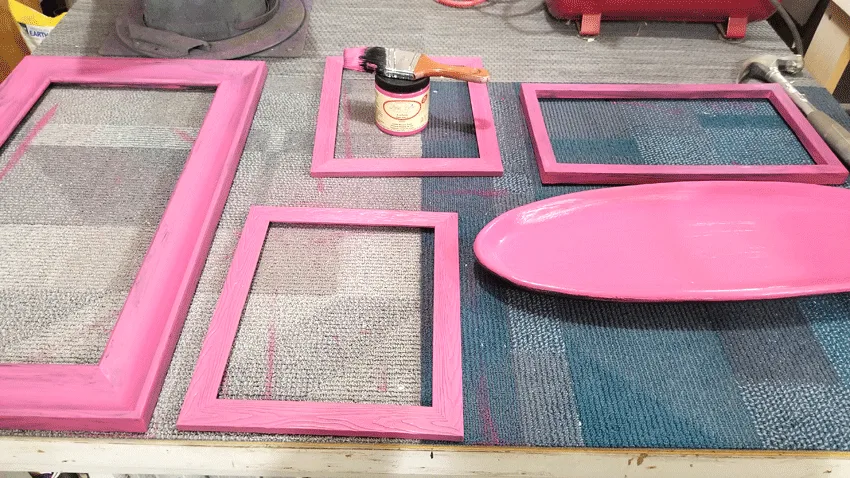 Pink frames after the first coat of chalk paint