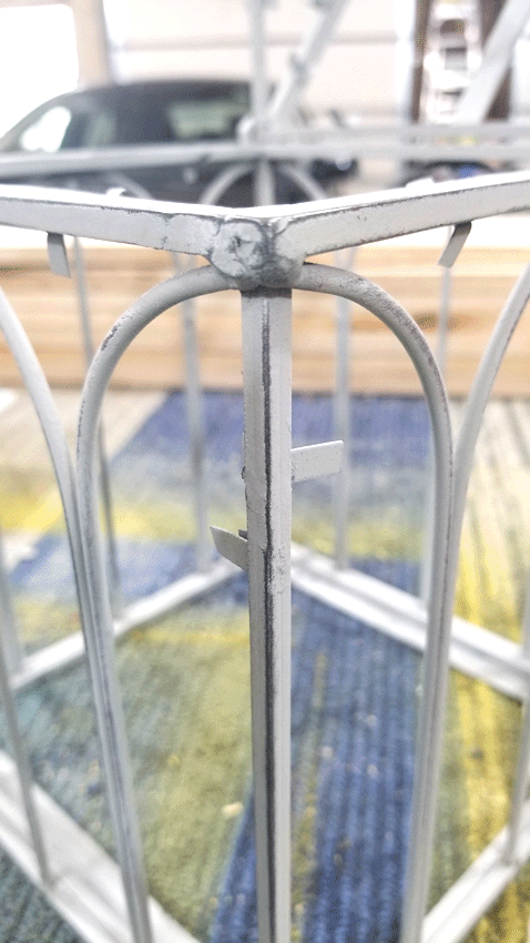 One of the corners of the greenhouse with the distressed sanded paint.