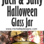 Finished Halloween glass jar. Jack and Sally layered vinyl design.