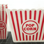 Dollar Tree red striped popcorn bucket and individual serving buckets