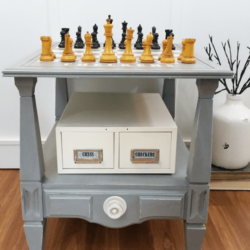 I used a HomeRight paint sprayer, some spray paint and some masking materials to paint a chess and checkers board. This was a fun DIY game table that anyone can create